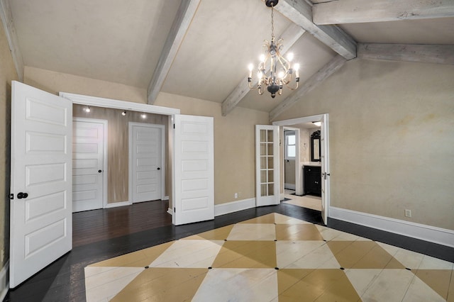 spare room with lofted ceiling with beams, a notable chandelier, and dark hardwood / wood-style flooring