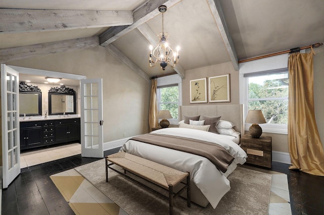 bedroom with french doors, ensuite bathroom, a chandelier, lofted ceiling with beams, and dark hardwood / wood-style flooring