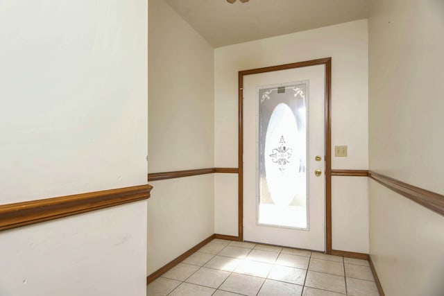 foyer featuring light tile patterned floors