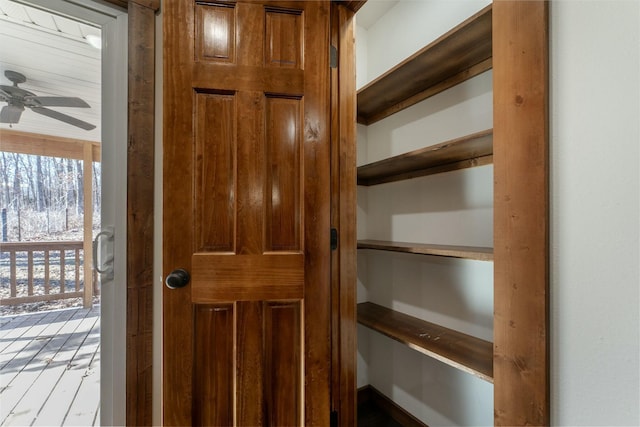 interior details featuring ceiling fan