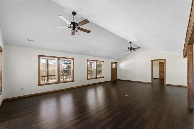 unfurnished living room featuring vaulted ceiling, ceiling fan, and dark hardwood / wood-style flooring