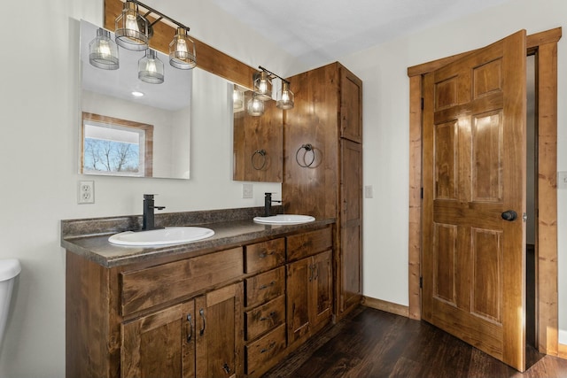 bathroom featuring vanity and wood-type flooring