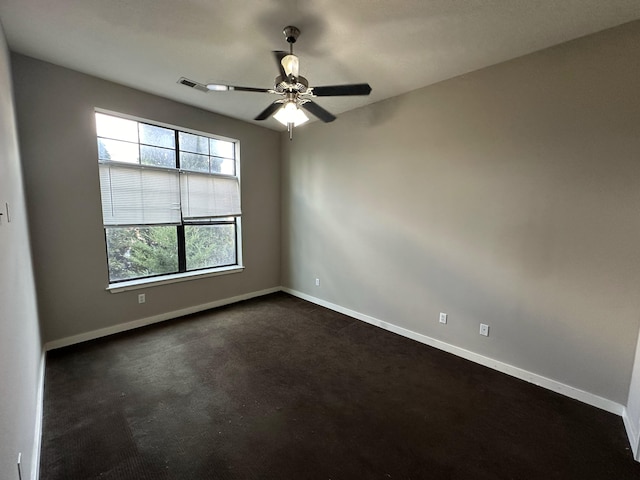 spare room featuring ceiling fan