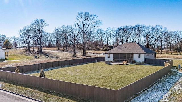 view of yard featuring a sunroom