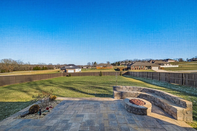 view of patio with a fire pit