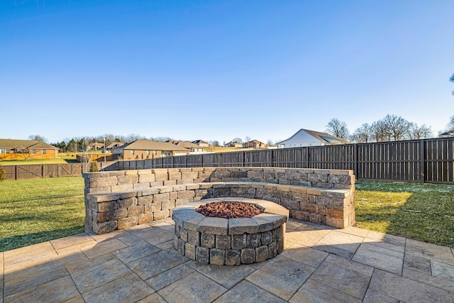 view of patio with an outdoor fire pit