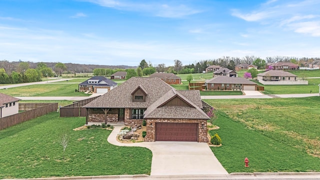 2320 Aid Hodgson Ln, West Plains, MO 65775 - view of front facade with fence, a garage, brick siding, a front lawn, and driveway