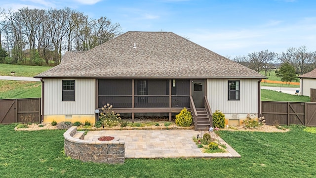 2320 Aid Hodgson Ln, West Plains, MO 65775 - rear view of house with a lawn, a sunroom, roof with shingles, and a patio area