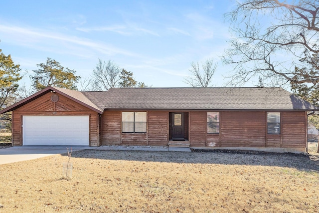 single story home with a garage