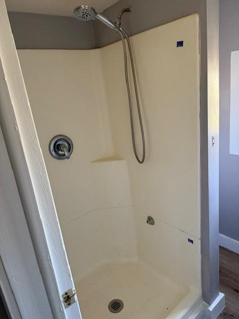 bathroom with walk in shower