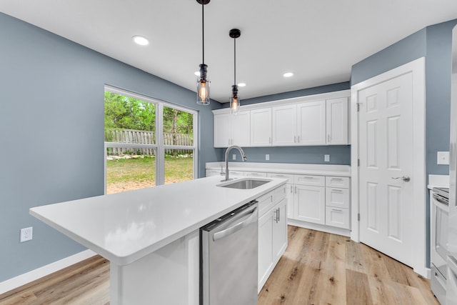 kitchen with pendant lighting, sink, dishwasher, an island with sink, and white cabinets