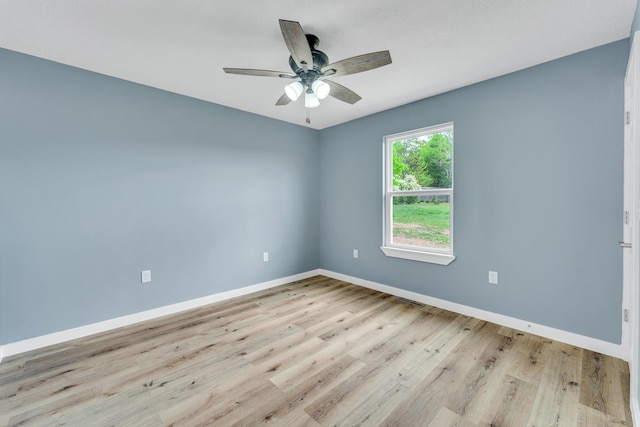 unfurnished room featuring ceiling fan and light hardwood / wood-style floors