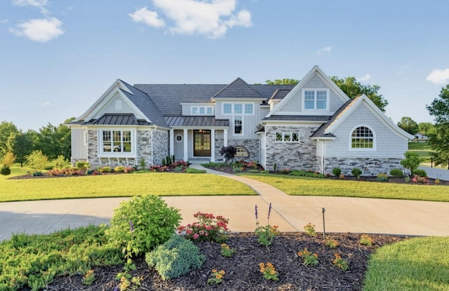 view of front of property with a front lawn