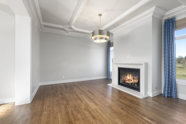 unfurnished living room featuring crown molding, dark wood-type flooring, coffered ceiling, a wealth of natural light, and beamed ceiling