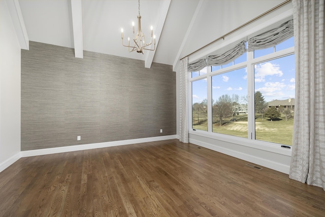 unfurnished dining area featuring beam ceiling, dark wood-type flooring, high vaulted ceiling, and a chandelier