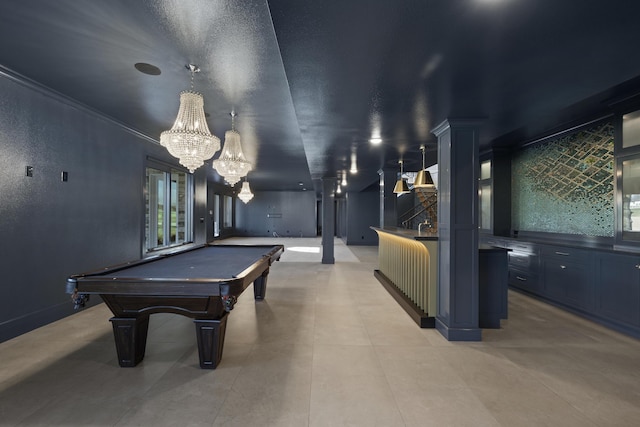 game room featuring ornate columns and pool table