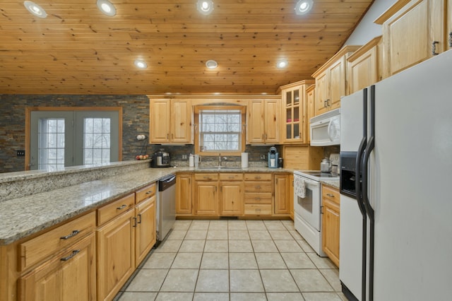 kitchen with sink, light stone counters, wood ceiling, light tile patterned floors, and white appliances