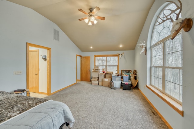 carpeted bedroom featuring ceiling fan and lofted ceiling