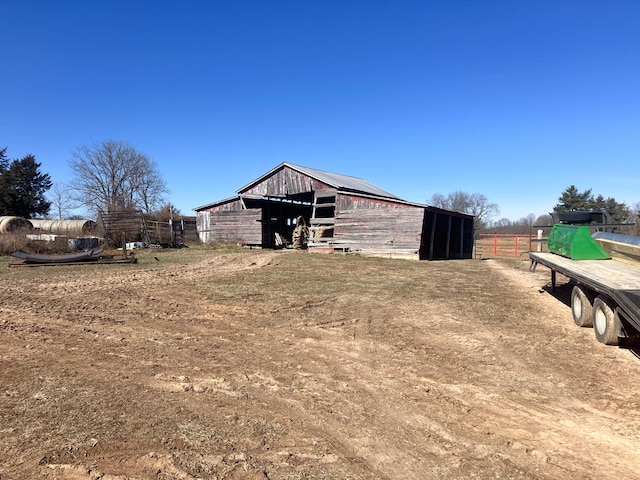 exterior space featuring an outbuilding