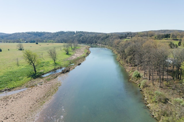 bird's eye view featuring a water view and a rural view