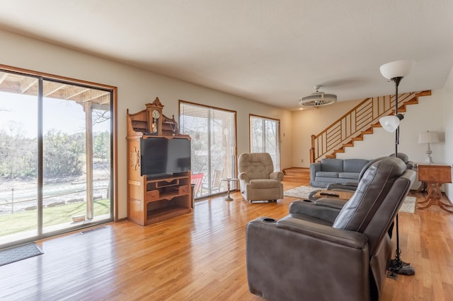 living room with light hardwood / wood-style flooring