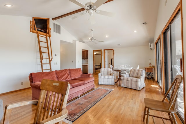 living room with lofted ceiling with beams, ceiling fan, and light hardwood / wood-style floors