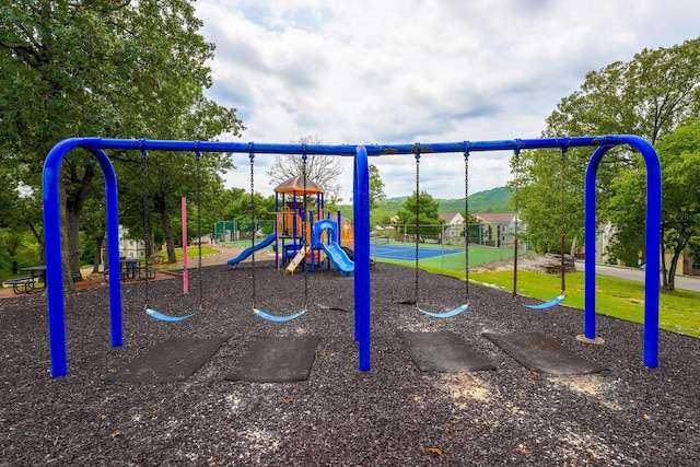 view of play area with tennis court