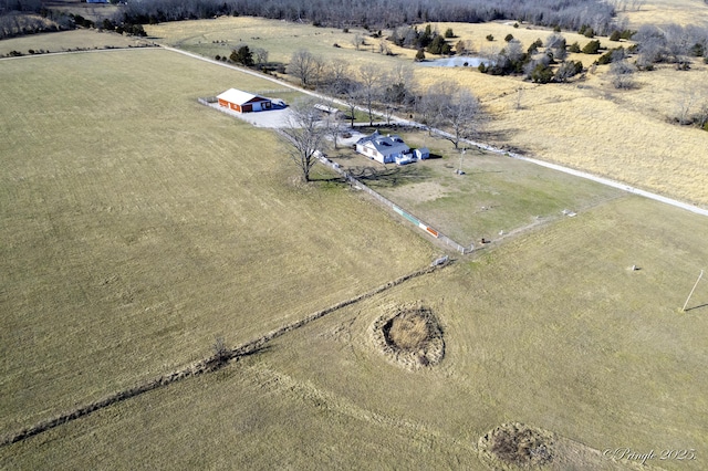 birds eye view of property featuring a rural view