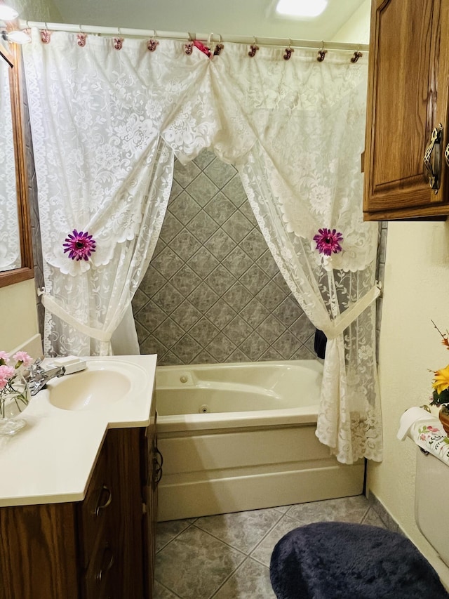 bathroom featuring vanity, tile patterned floors, and shower / bath combo