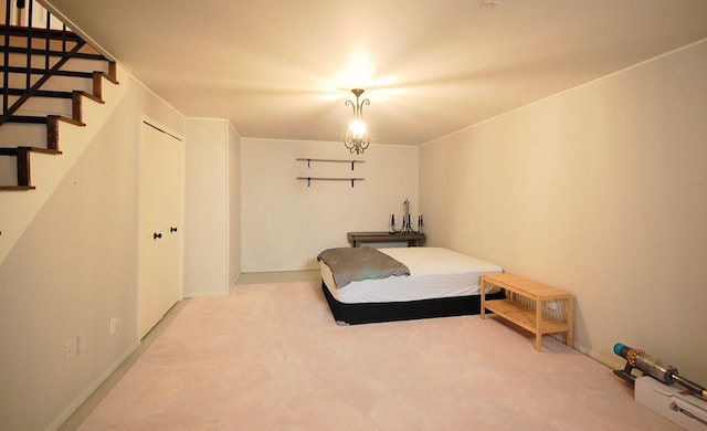 carpeted bedroom featuring a closet