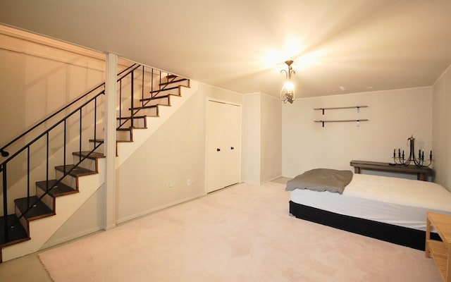 bedroom with carpet floors and a closet