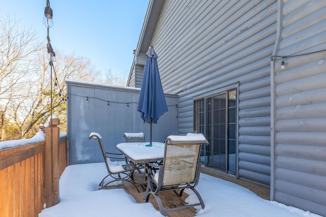 view of snow covered patio