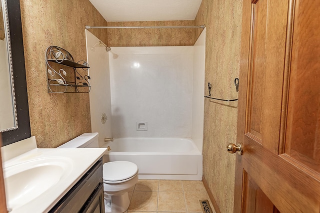 full bathroom with tile patterned floors, vanity, toilet, and  shower combination