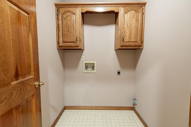 laundry area with cabinets, hookup for a washing machine, and electric dryer hookup