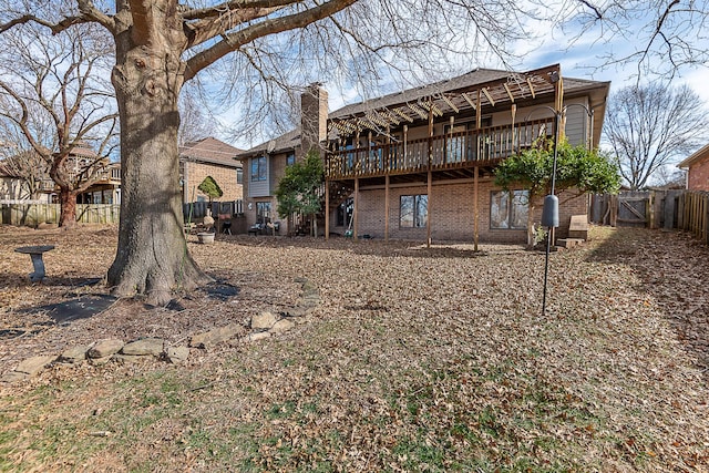 rear view of house with a deck