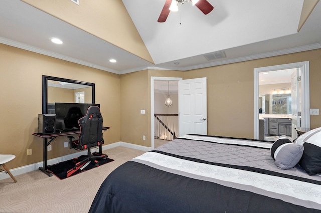 bedroom with ceiling fan, ornamental molding, connected bathroom, and light colored carpet