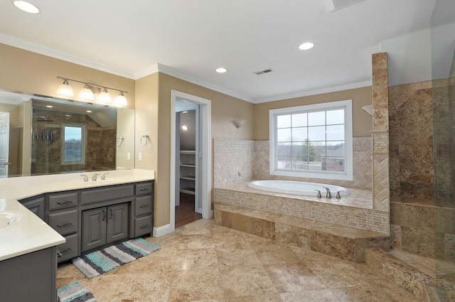 bathroom featuring vanity, ornamental molding, and plus walk in shower