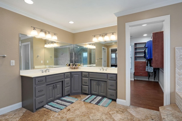 bathroom with vanity and ornamental molding