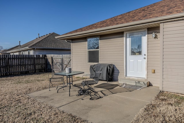 view of patio featuring a grill