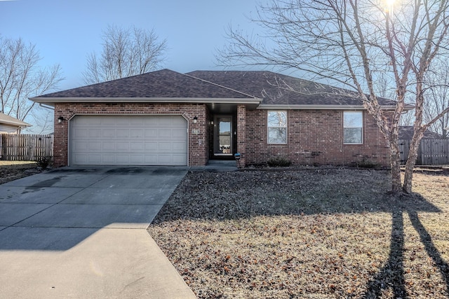 single story home with a garage