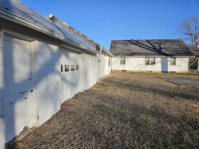 view of home's exterior featuring a garage