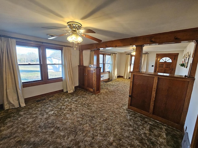 interior space featuring plenty of natural light and ceiling fan