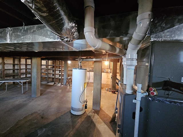 utility room featuring gas water heater