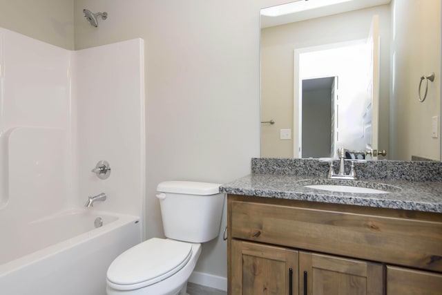 full bathroom with shower / bathing tub combination, vanity, and toilet