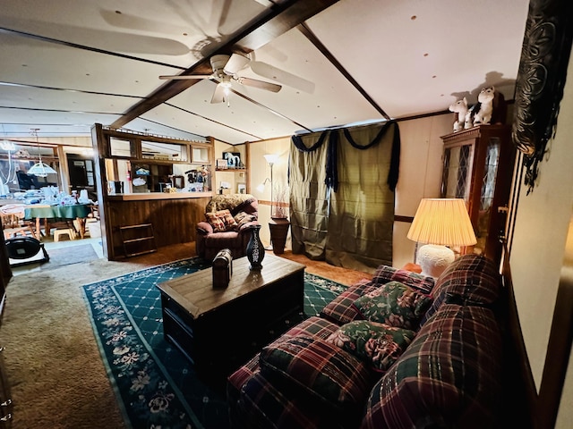 interior space with lofted ceiling with beams, ceiling fan, and carpet floors