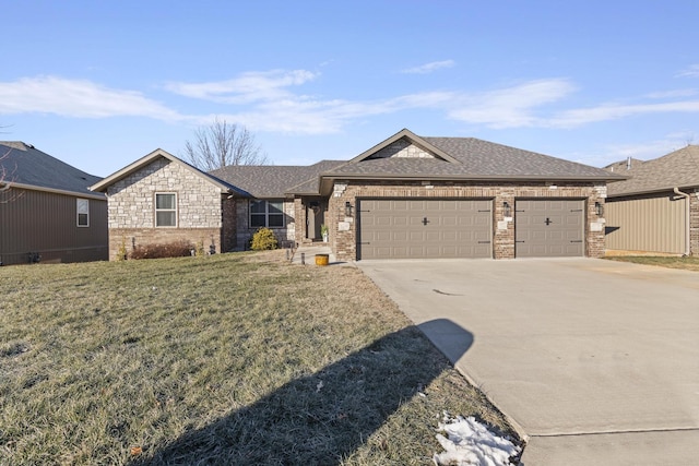 view of front of home with a garage and a front yard