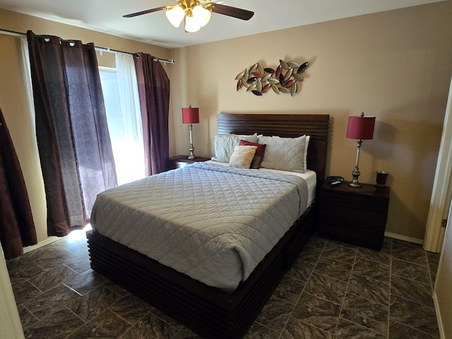 bedroom featuring ceiling fan