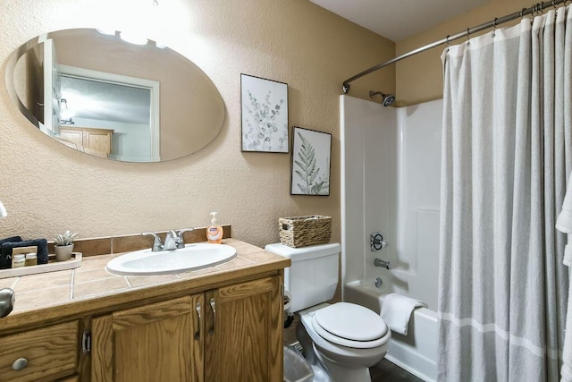 full bathroom featuring vanity, toilet, and shower / bath combo with shower curtain