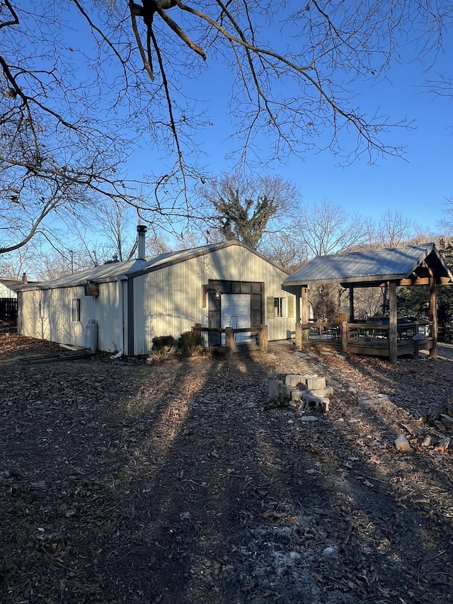 rear view of house with a gazebo