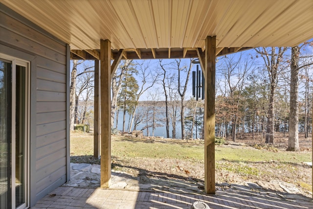 view of patio / terrace with a water view